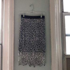 Black and white lace pencil skirt.